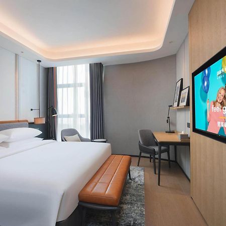 Park Inn By Radisson Nanchong Yilong Star City Plaza Eksteriør billede