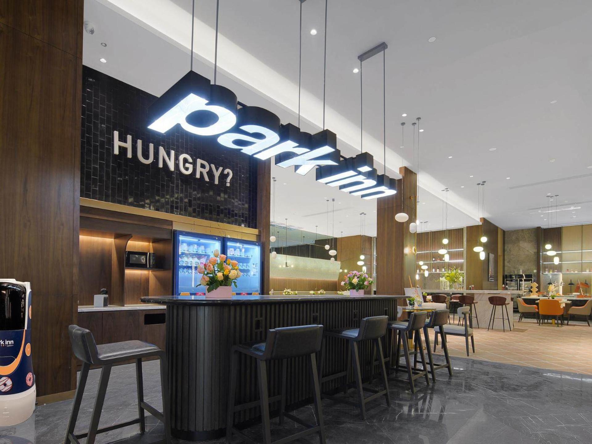 Park Inn By Radisson Nanchong Yilong Star City Plaza Eksteriør billede